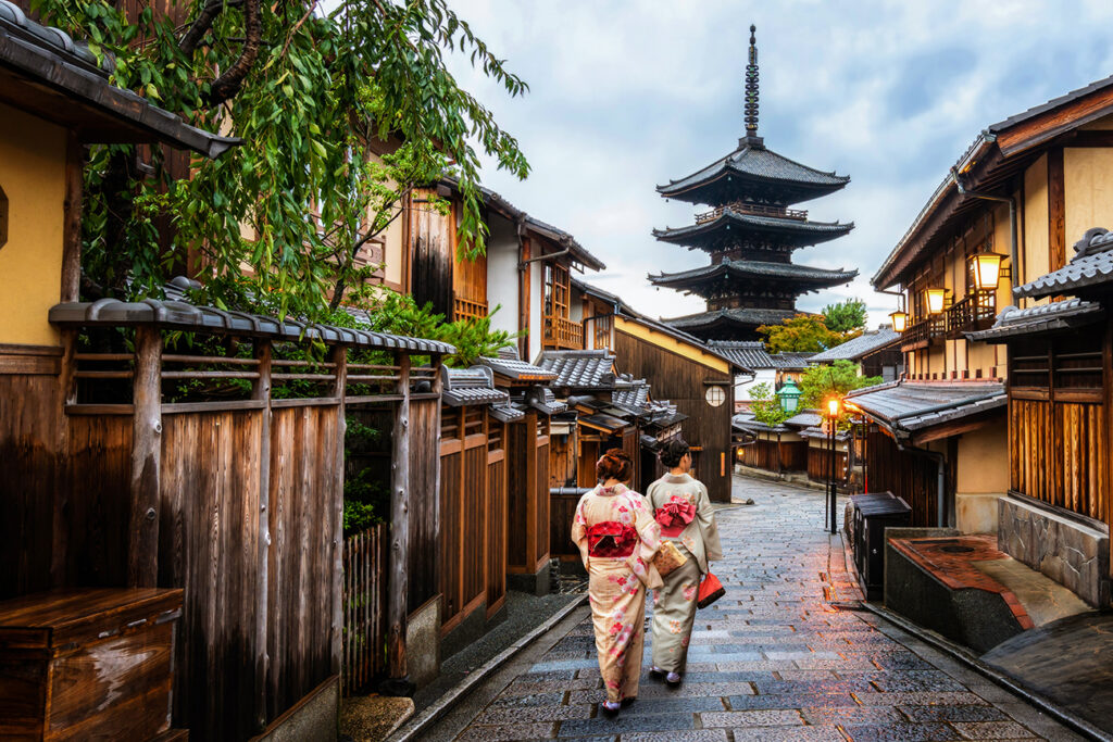 Kyoto, Japan Culture Travel - Asian traveler wearing traditional Japanese kimono walking in Higashiyama district in the old town of Kyoto, Japan.